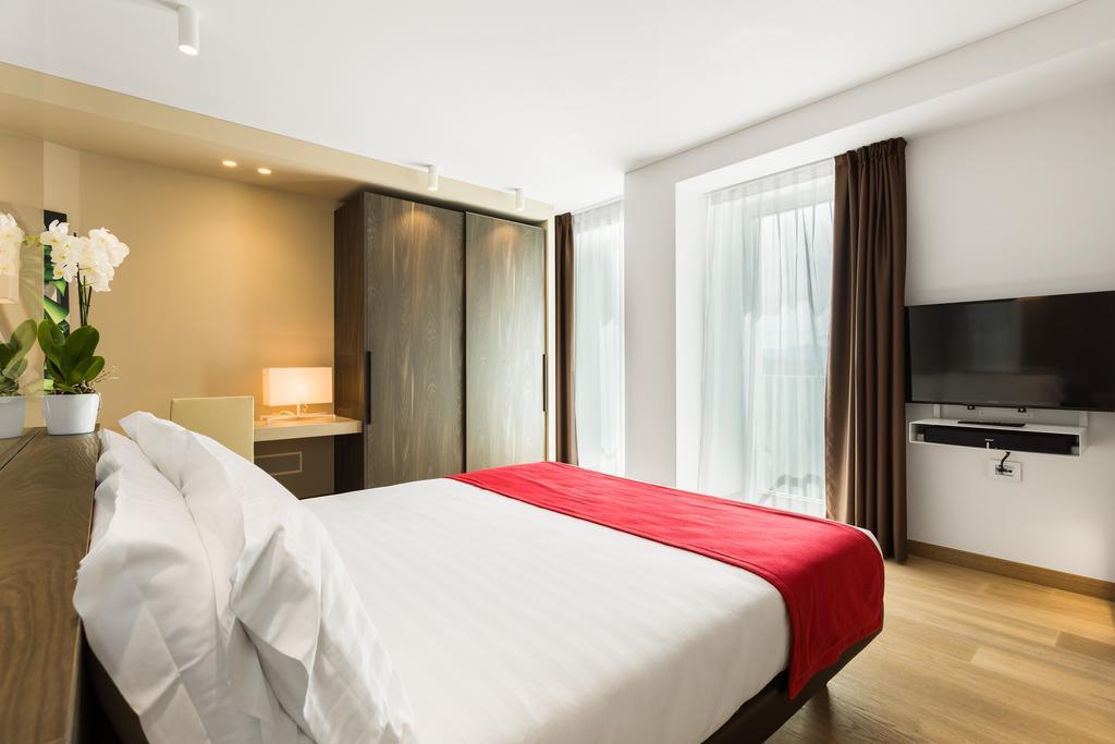 Suites Hotel Astor Belluno Pokoj fotografie