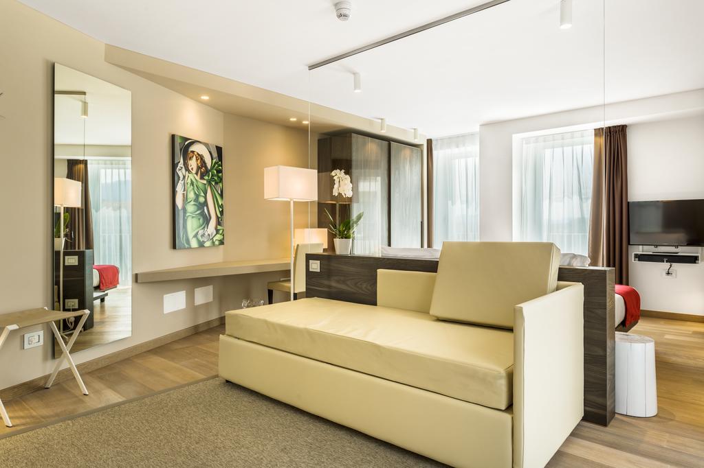 Suites Hotel Astor Belluno Pokoj fotografie