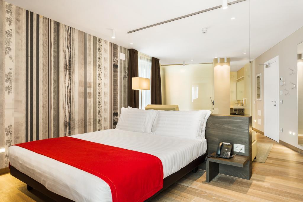 Suites Hotel Astor Belluno Pokoj fotografie